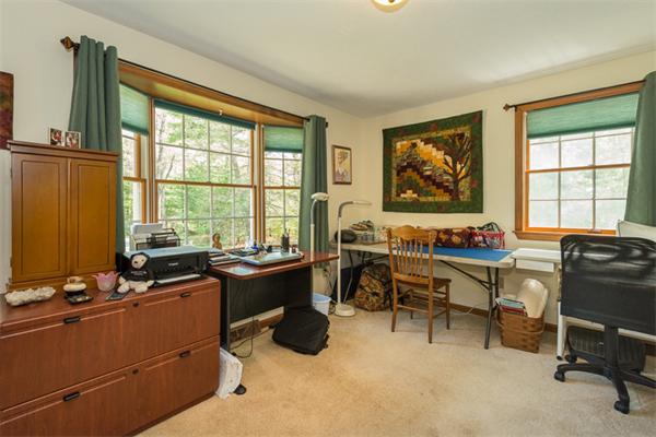 53 Baker Road Salisbury, MA 01952 - Photo 10 of 25 a view of a workspace with a window and lounge chair