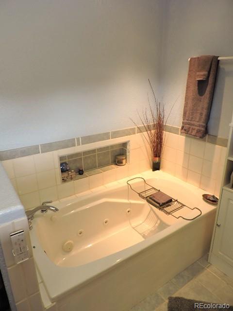 3818 Fontaine Road Fort Garland, CO 81133 - Photo 18 of 50 a bathroom with a sink and a bathtub