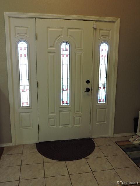 3818 Fontaine Road Fort Garland, CO 81133 - Photo 3 of 50 a view of a hallway with wooden floor