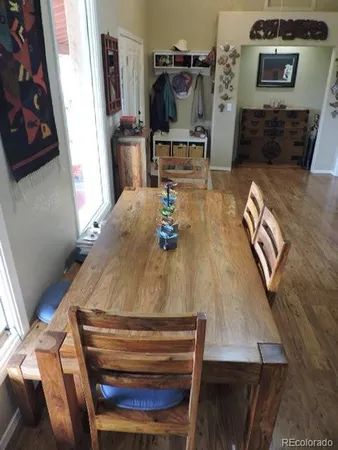 a spacious bathroom with a granite countertop sink and a mirror