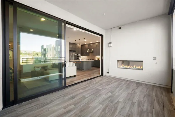 a view of an empty room and window