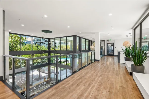 a view of building with glass door