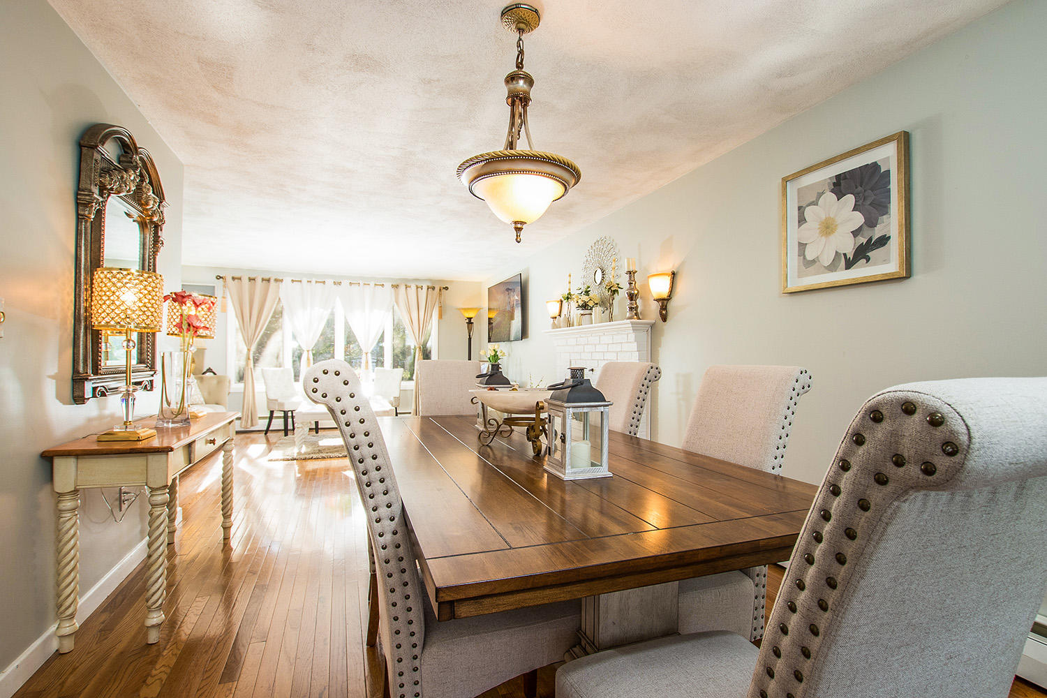 56 Wedgewood Drive Centerville, MA 02632 - Photo 11 of 34 a view of a dining room with furniture and wooden floor