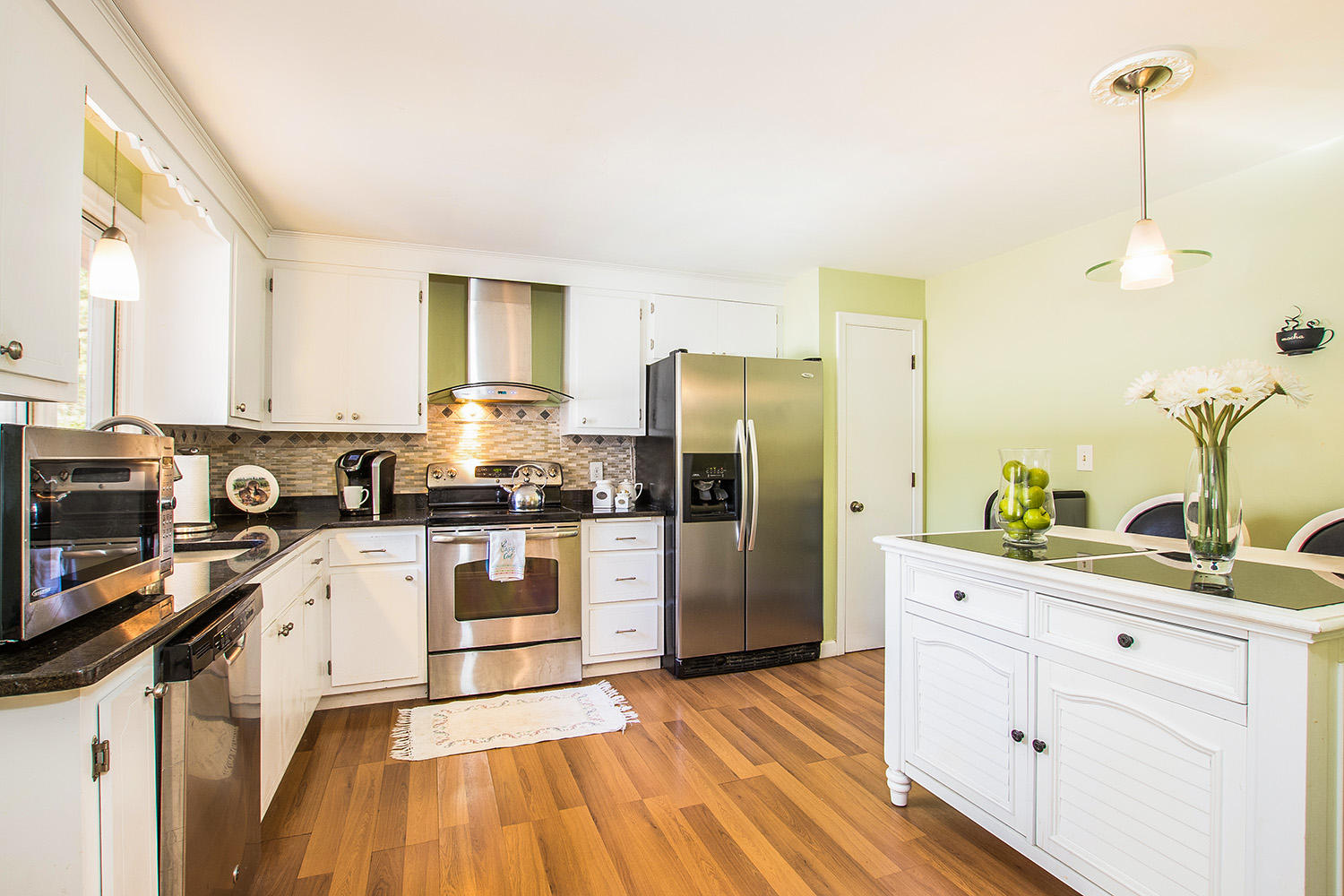 56 Wedgewood Drive Centerville, MA 02632 - Photo 12 of 34 a kitchen with stainless steel appliances a refrigerator sink and cabinets