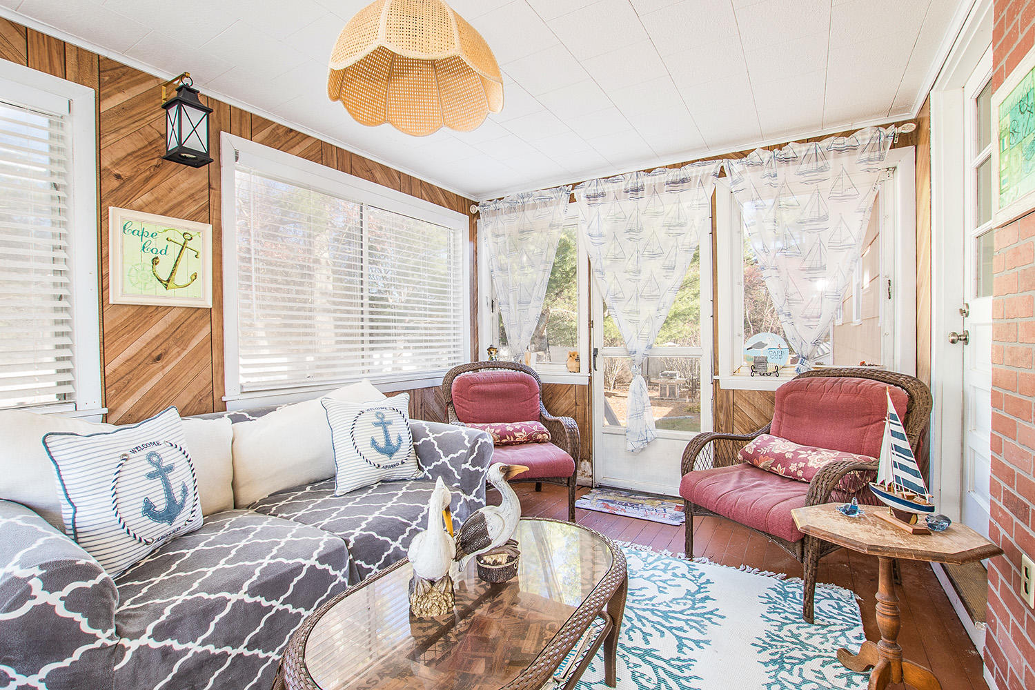 56 Wedgewood Drive Centerville, MA 02632 - Photo 17 of 34 a living room with furniture and a large window
