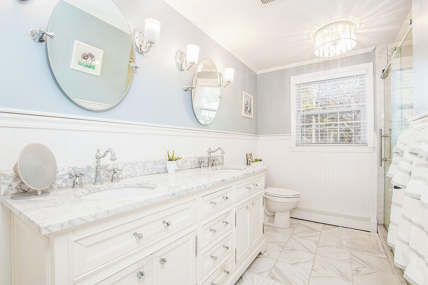 56 Wedgewood Drive Centerville, MA 02632 - Photo 18 of 34 a bathroom with a granite countertop toilet sink and mirror