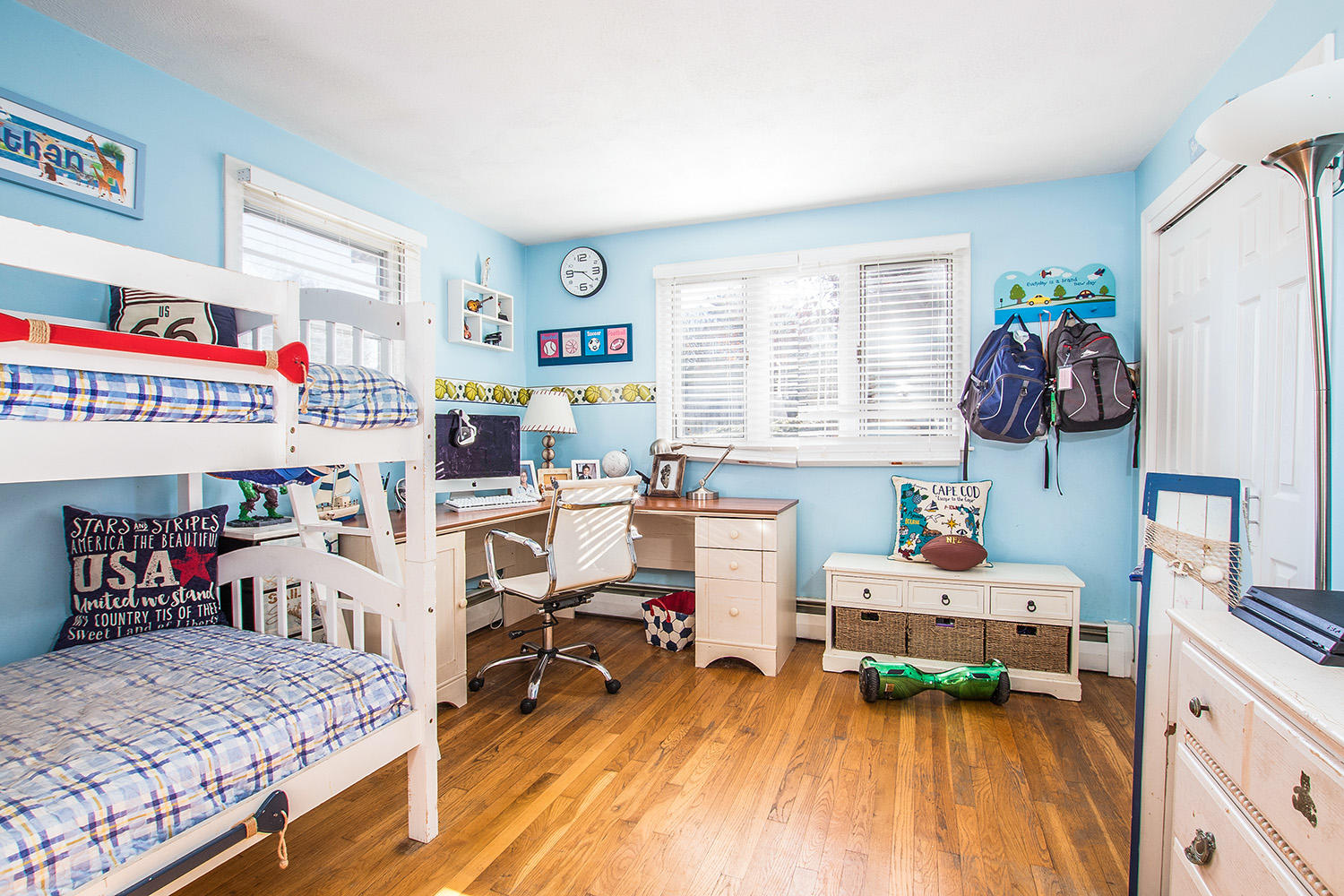 56 Wedgewood Drive Centerville, MA 02632 - Photo 22 of 34 a bedroom with a bed and a wooden floor