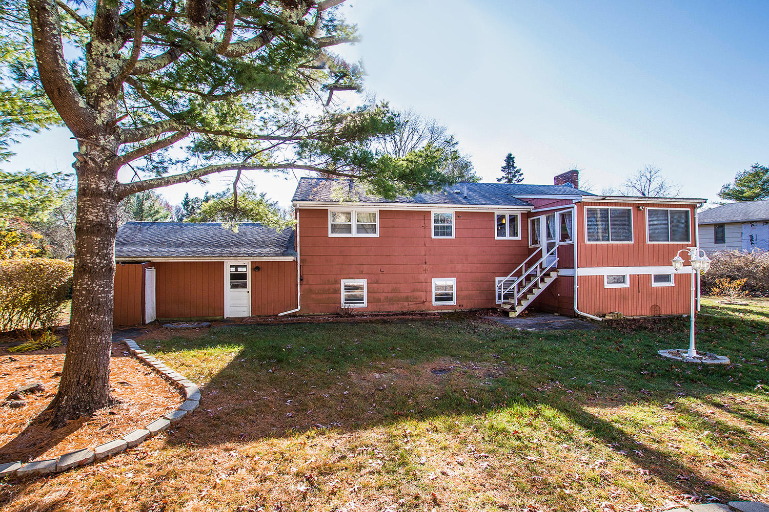 56 Wedgewood Drive Centerville, MA 02632 - Photo 32 of 34 a backyard of a house with barbeque oven