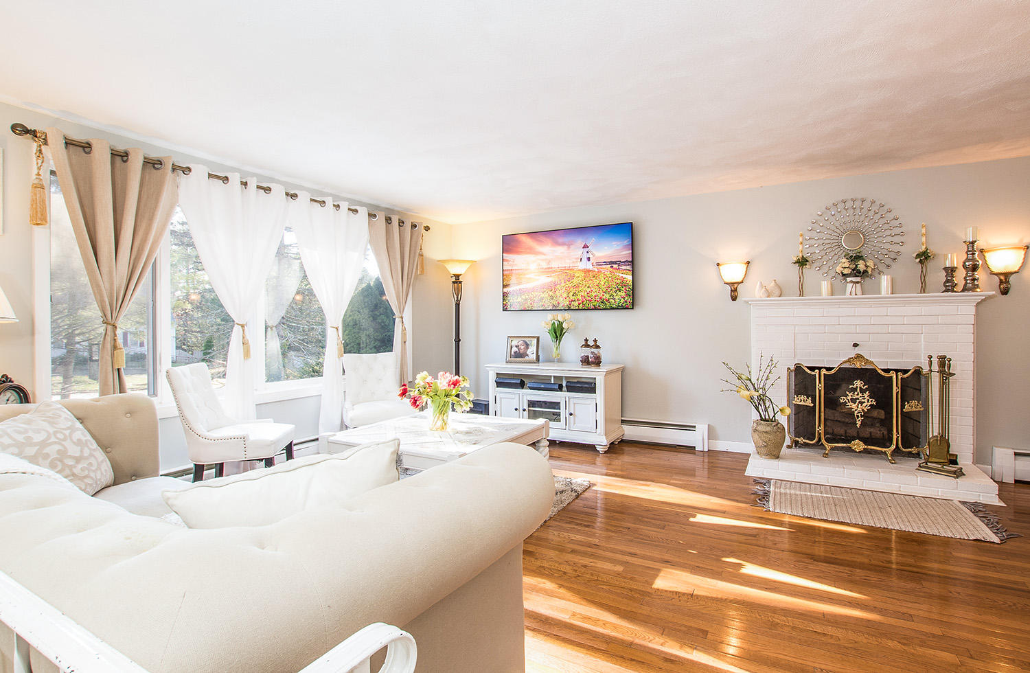 56 Wedgewood Drive Centerville, MA 02632 - Photo 5 of 34 a living room with furniture large window and a flat screen tv