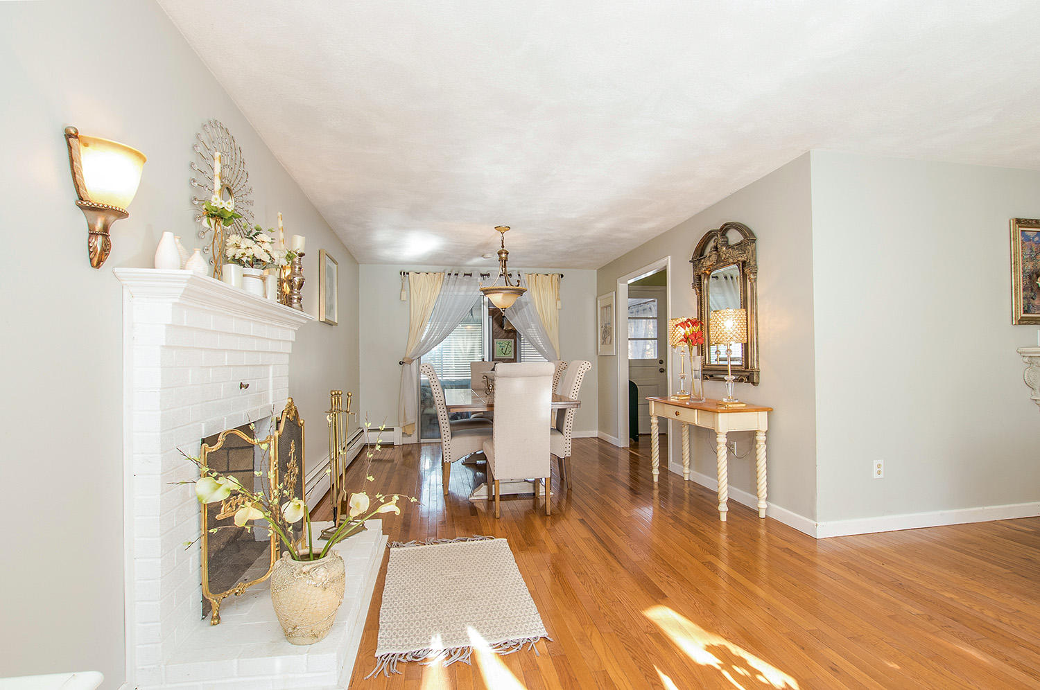 56 Wedgewood Drive Centerville, MA 02632 - Photo 8 of 34 a living room with furniture and a wooden floor