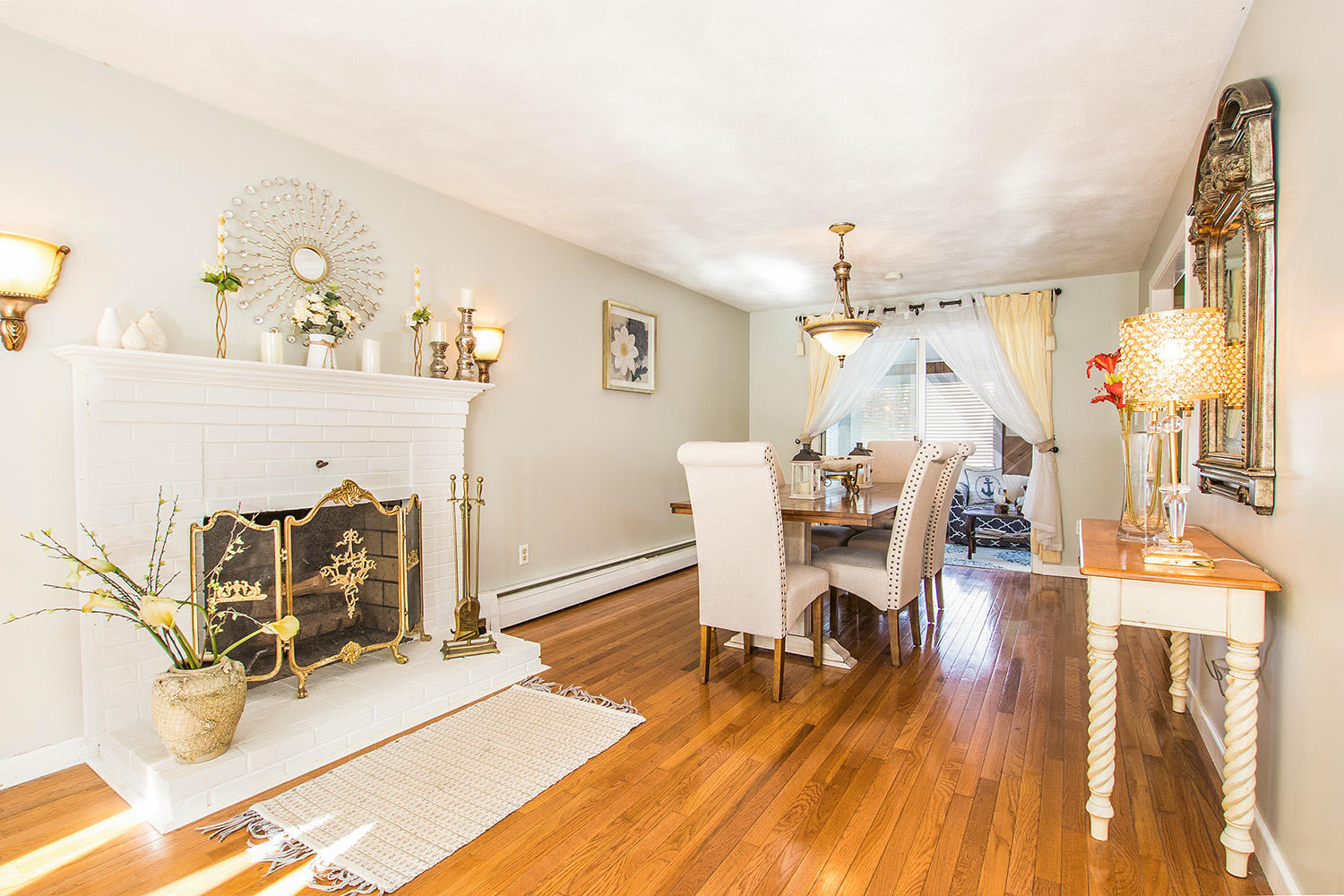 56 Wedgewood Drive Centerville, MA 02632 - Photo 9 of 34 a view of a dining room with furniture and wooden floor