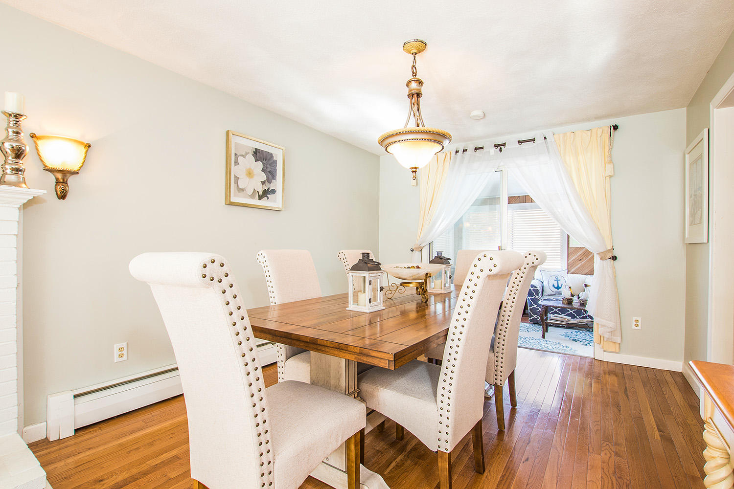 56 Wedgewood Drive Centerville, MA 02632 - Photo 10 of 34 a view of a dining room with furniture window and wooden floor