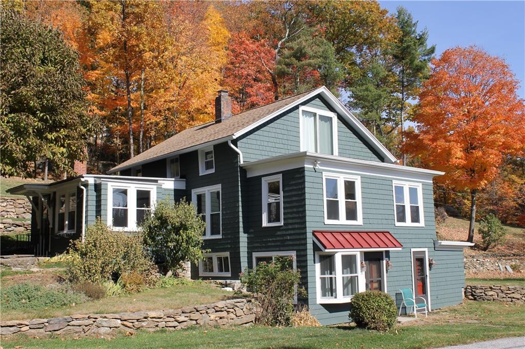 45 Curtiss Road Warren, CT 06777 - Photo 1 of 1 a front view of a house with a yard