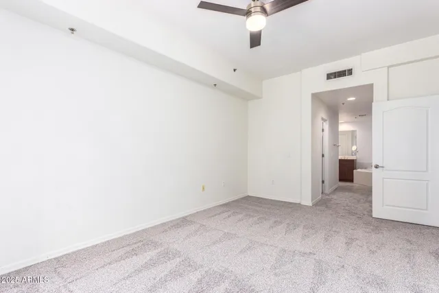 an empty room with a bathroom