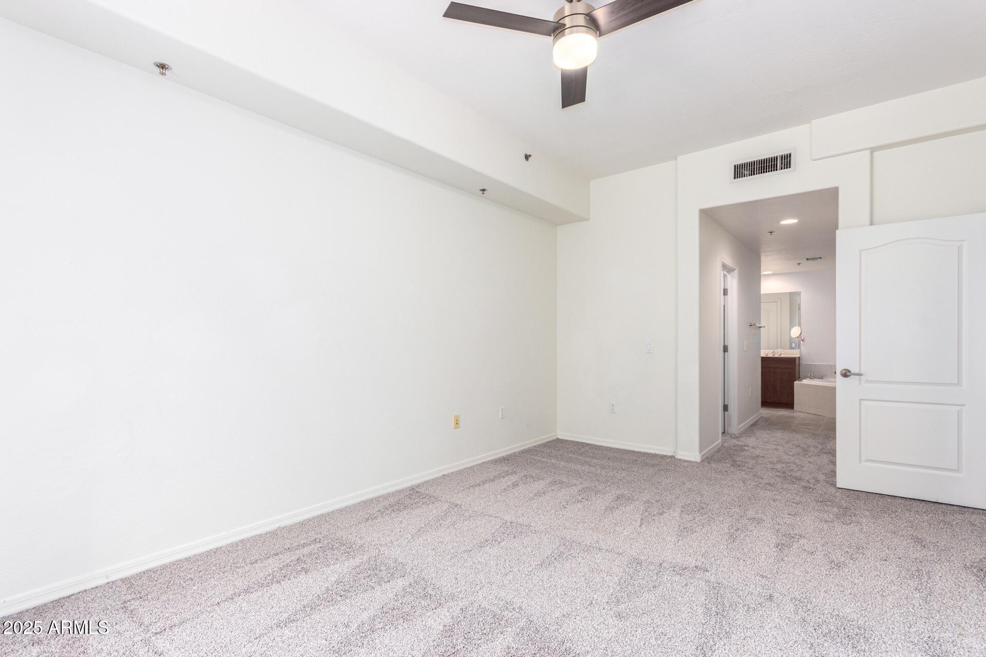 17 West Vernon Avenue, Unit 117 Phoenix, AZ 85003 - Photo 24 of 38 an empty room with a bathroom