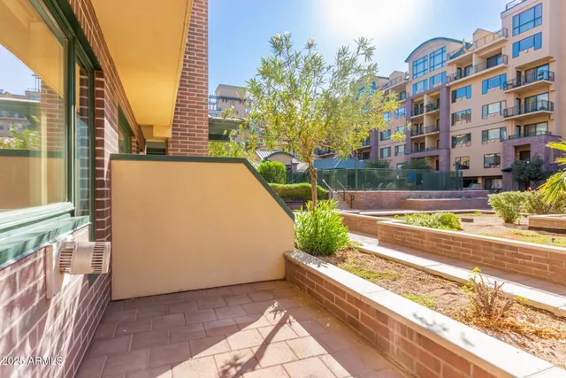 a view of a swimming pool with a lounge chairs