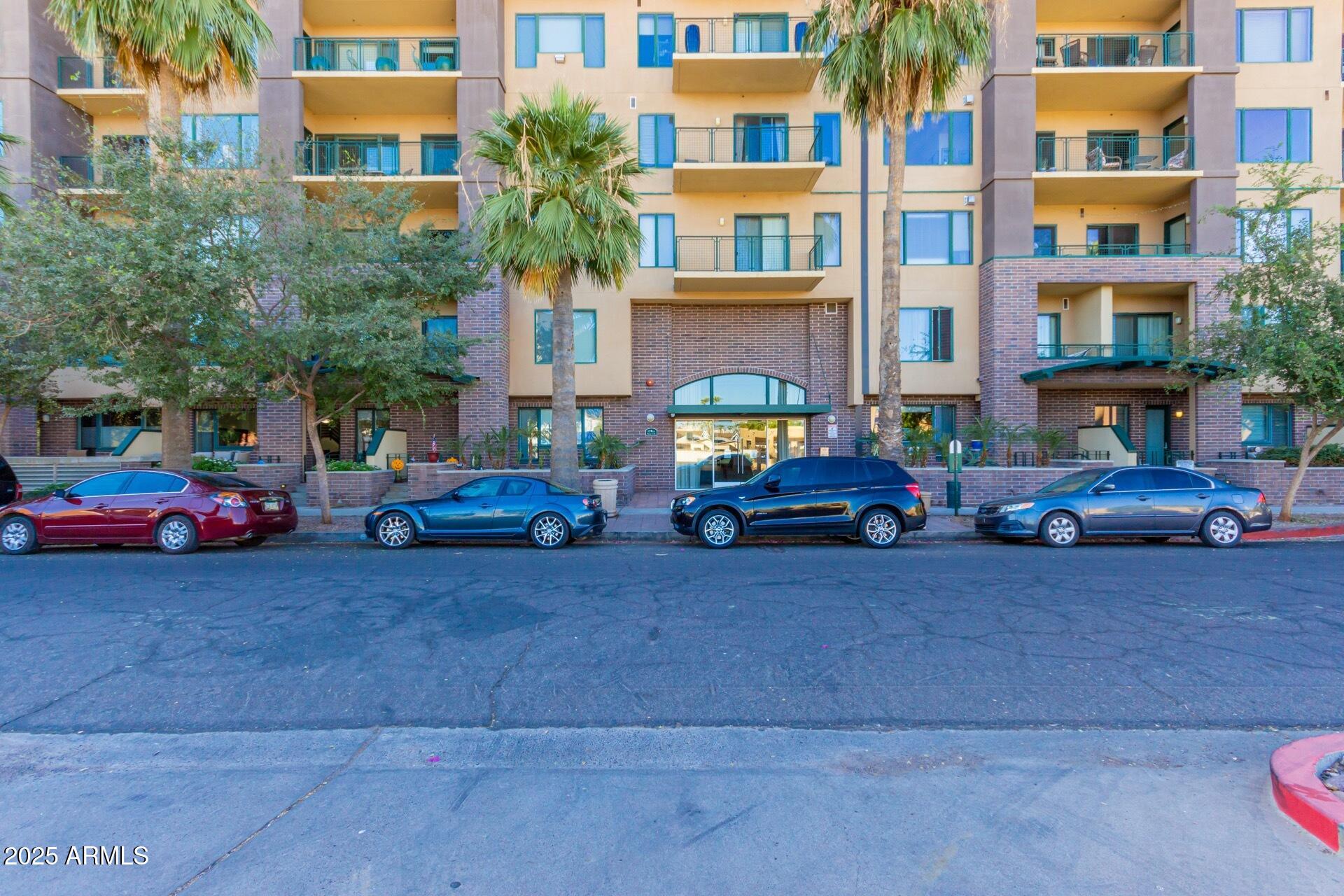 17 West Vernon Avenue, Unit 117 Phoenix, AZ 85003 - Photo 26 of 38 a car parked in front of a building