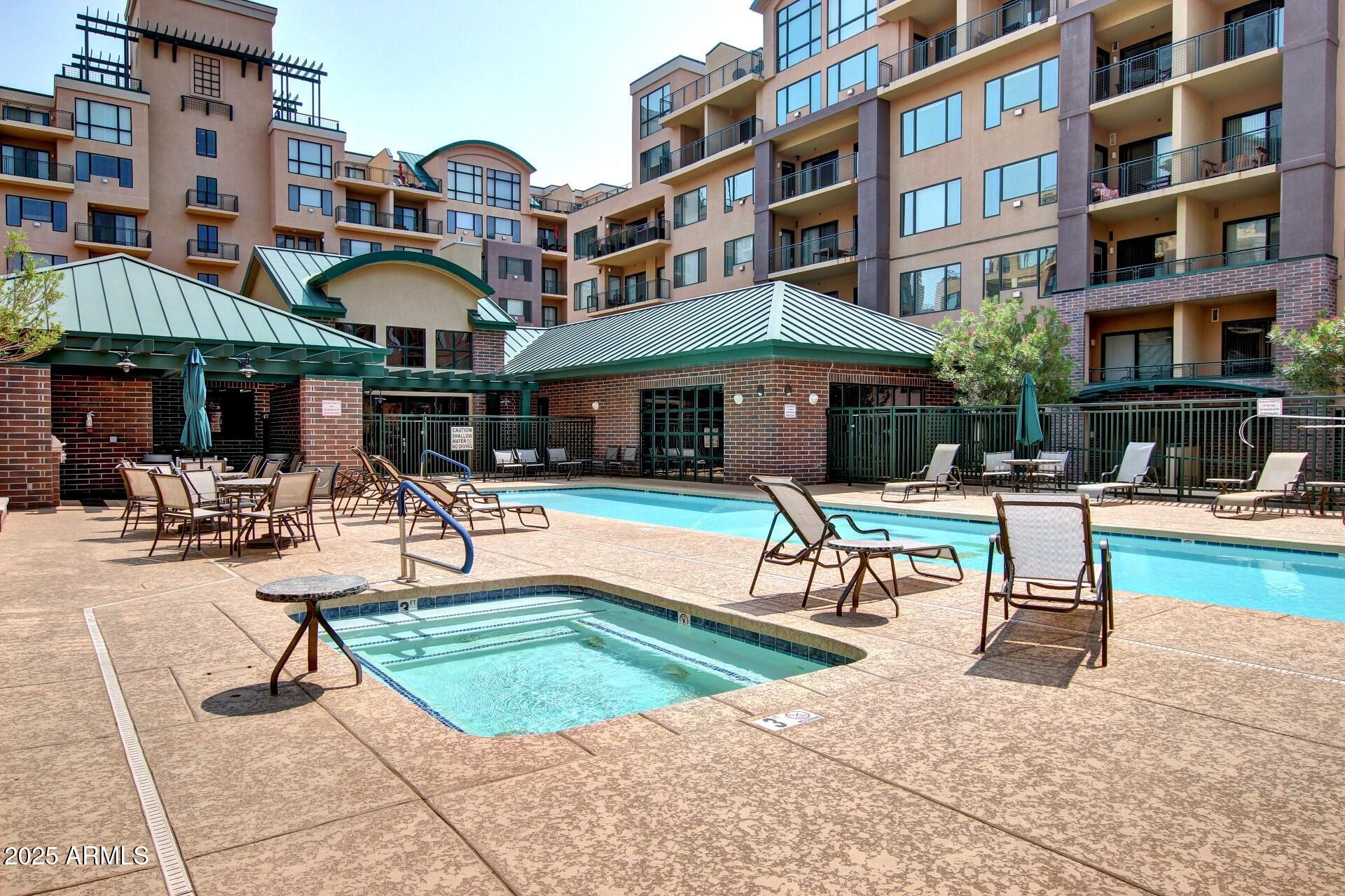 17 West Vernon Avenue, Unit 117 Phoenix, AZ 85003 - Photo 28 of 38 a view of a building with sitting area