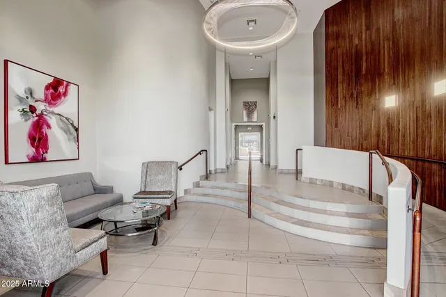 a living room with furniture and a table