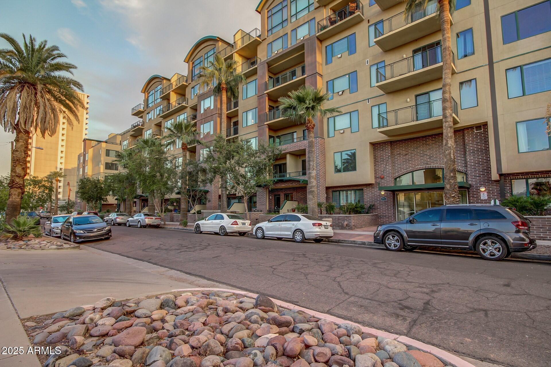 17 West Vernon Avenue, Unit 117 Phoenix, AZ 85003 - Photo 33 of 38 a car parked in front of a building
