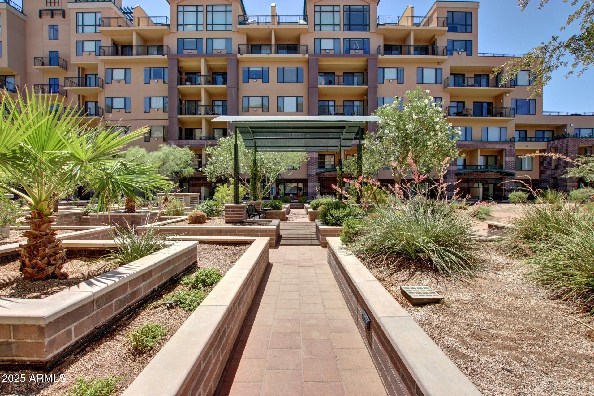 17 West Vernon Avenue, Unit 117 Phoenix, AZ 85003 - Photo 37 of 38 a view of multiple houses with a yard