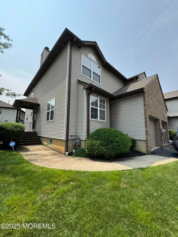 a view of outdoor space yard and front view of a house