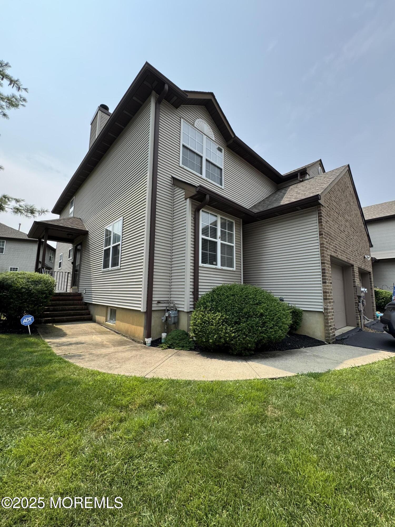 a view of outdoor space yard and front view of a house