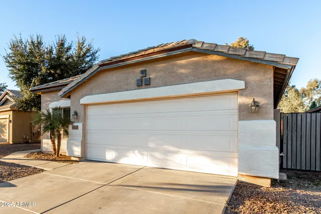 a view of a house with a garage