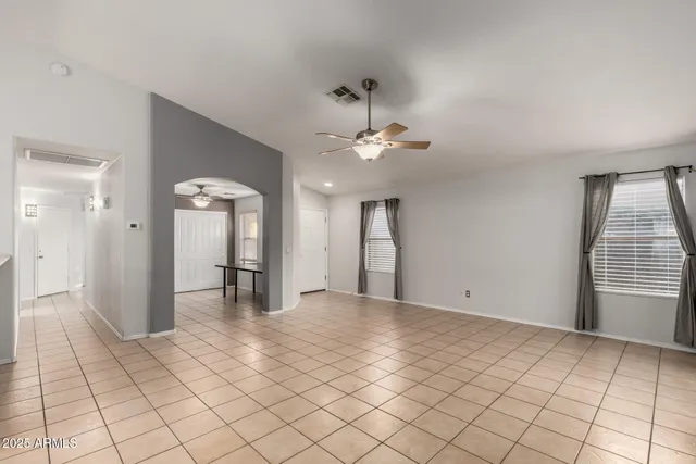 a view of an empty room and window