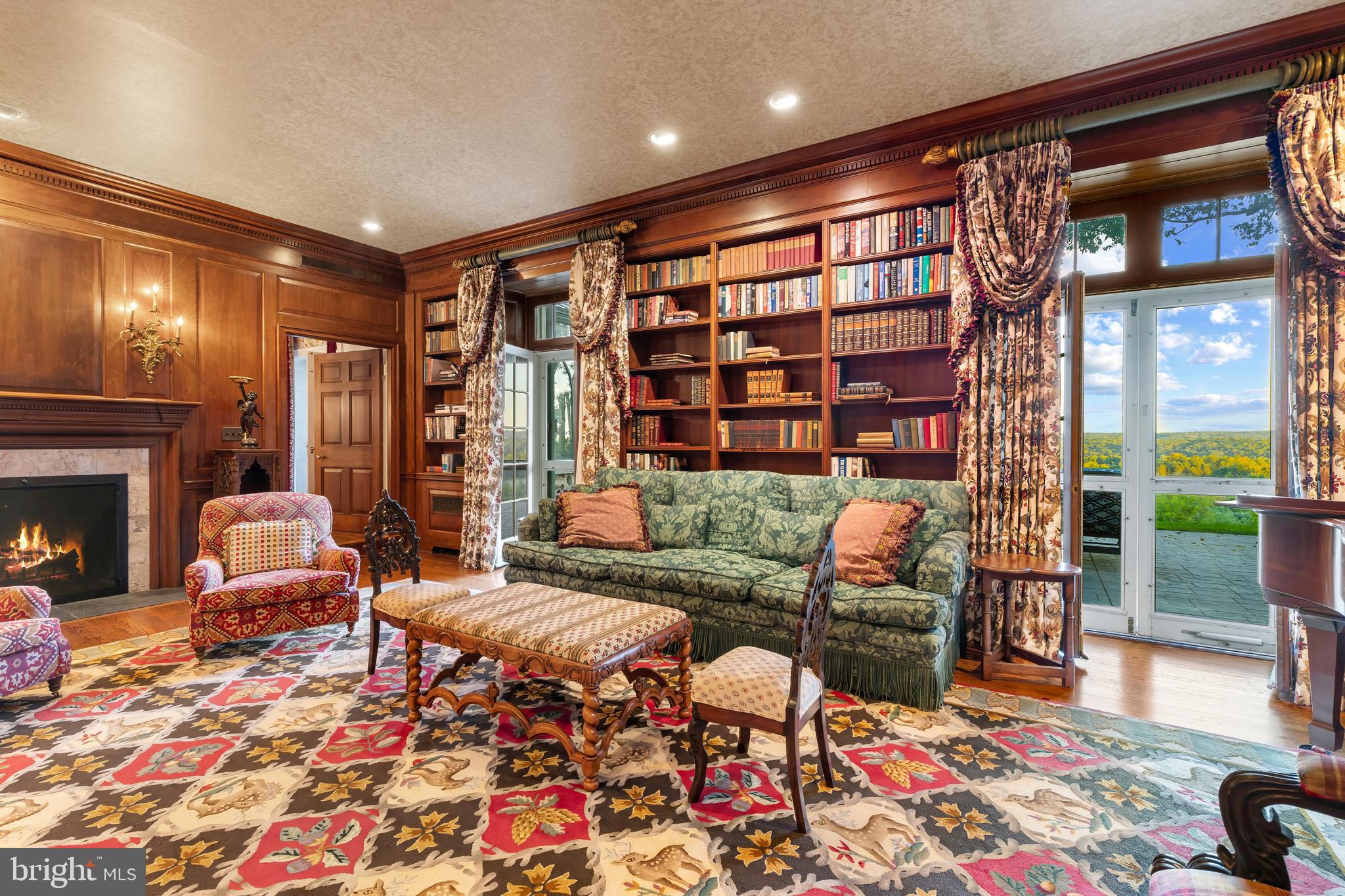 3600 Butler Road Glyndon, MD 21136 - Photo 18 of 99 a living room with furniture and a fireplace