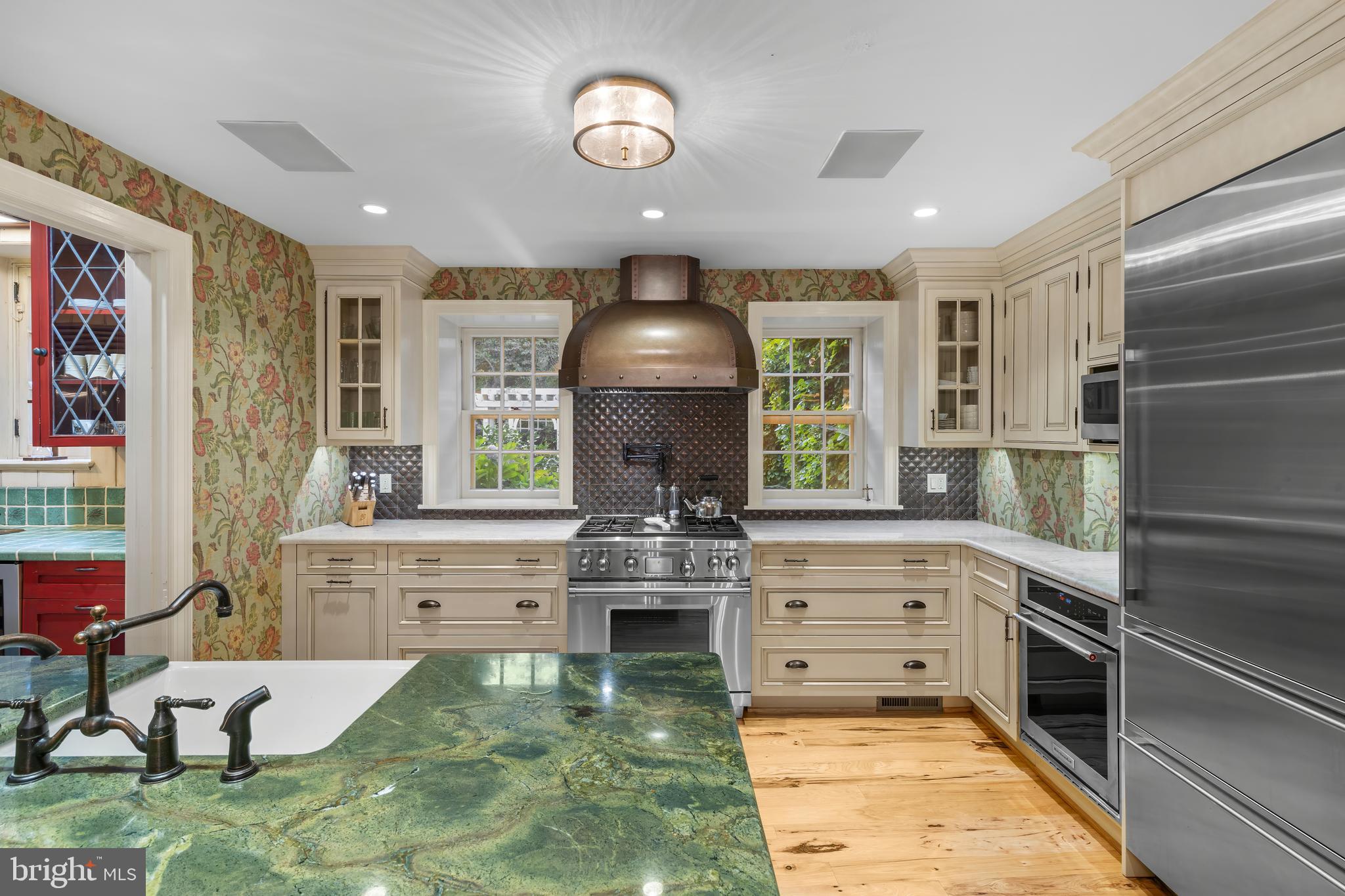 3600 Butler Road Glyndon, MD 21136 - Photo 63 of 99 a kitchen with kitchen island white cabinets and stainless steel appliances