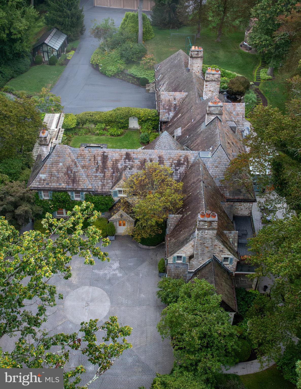 3600 Butler Road Glyndon, MD 21136 - Photo 70 of 99 an aerial view of a house with a garden and swimming pool