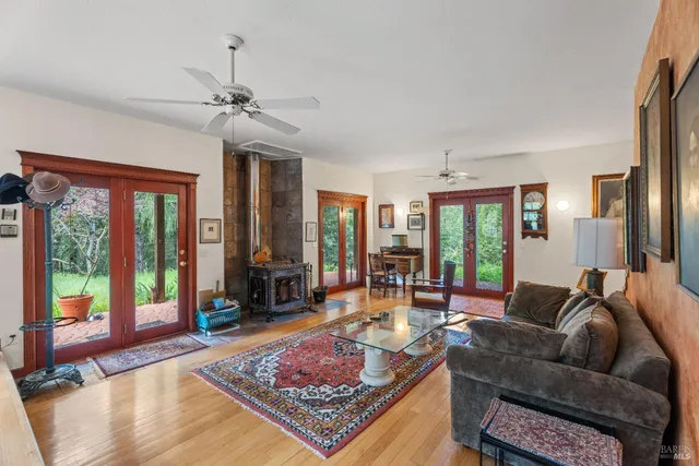 a living room with furniture and a rug