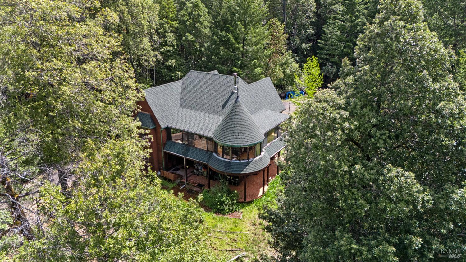 20475 Timber Road Willits, CA 95490 - Photo 31 of 38 a aerial view of a house with a yard and large trees