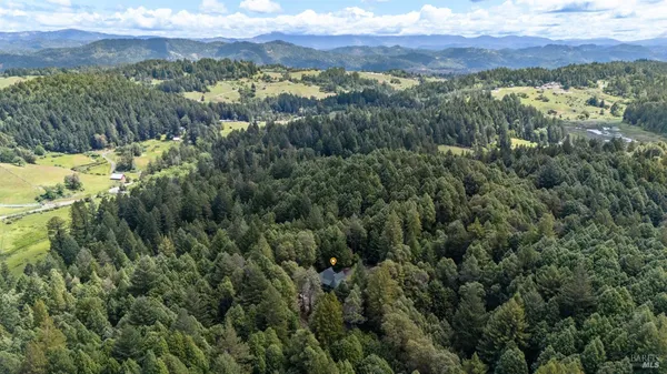 a view of a city with mountain