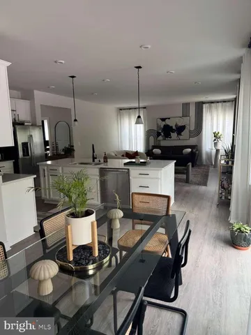 a room with a mirror and furniture