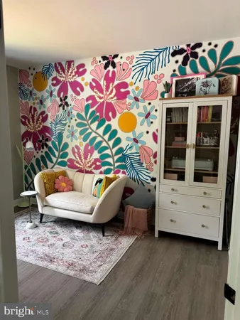 a workspace with furniture and a window