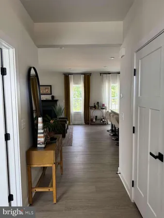 a view of a livingroom with furniture and windows