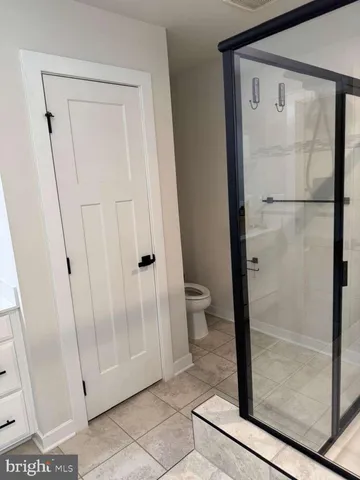 a bath tub sitting next to a window