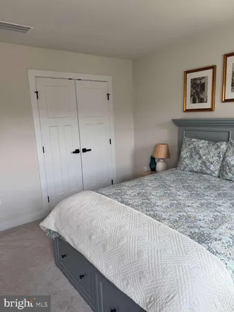 a room with gym equipment and a large window