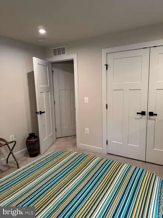 a view of yard with swimming pool and seating