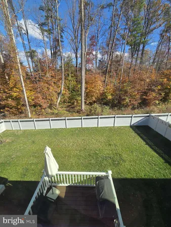 a view of a house with a back yard