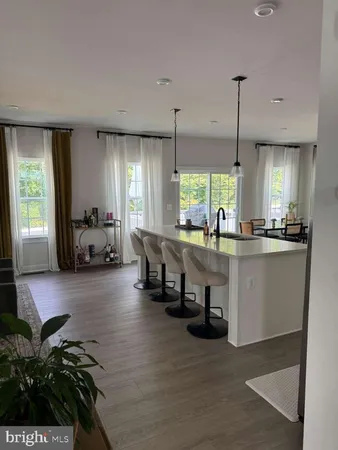 a kitchen with lots of counter top space and a window