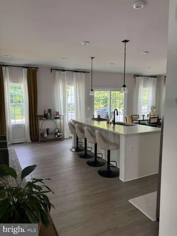 a kitchen with lots of counter top space and a window