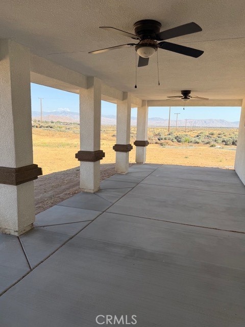 16925 Nanticoke Road Apple Valley, CA 92307 - Photo 34 of 87 a view of a kitchen with a large window and a view of living room