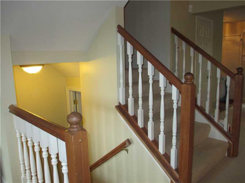 5 Castle View Drive McKees Rocks, PA 15136 - Photo 3 of 25 a view of staircase with railing and a chandelier