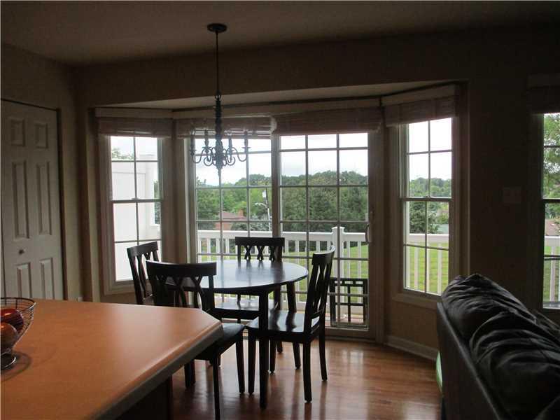 5 Castle View Drive McKees Rocks, PA 15136 - Photo 5 of 25 a view of a dining room with furniture window and wooden floor