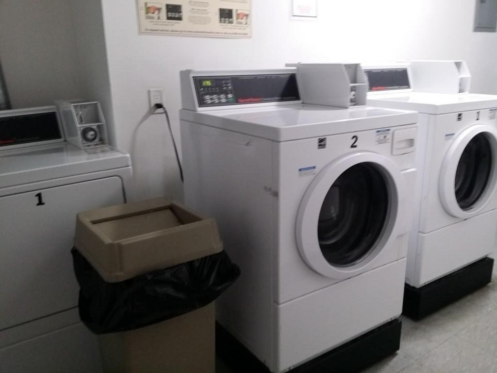 12 Commonwealth Court, Unit 15 Boston, MA 02135 - Photo 12 of 12 a utility room with dryer and washer