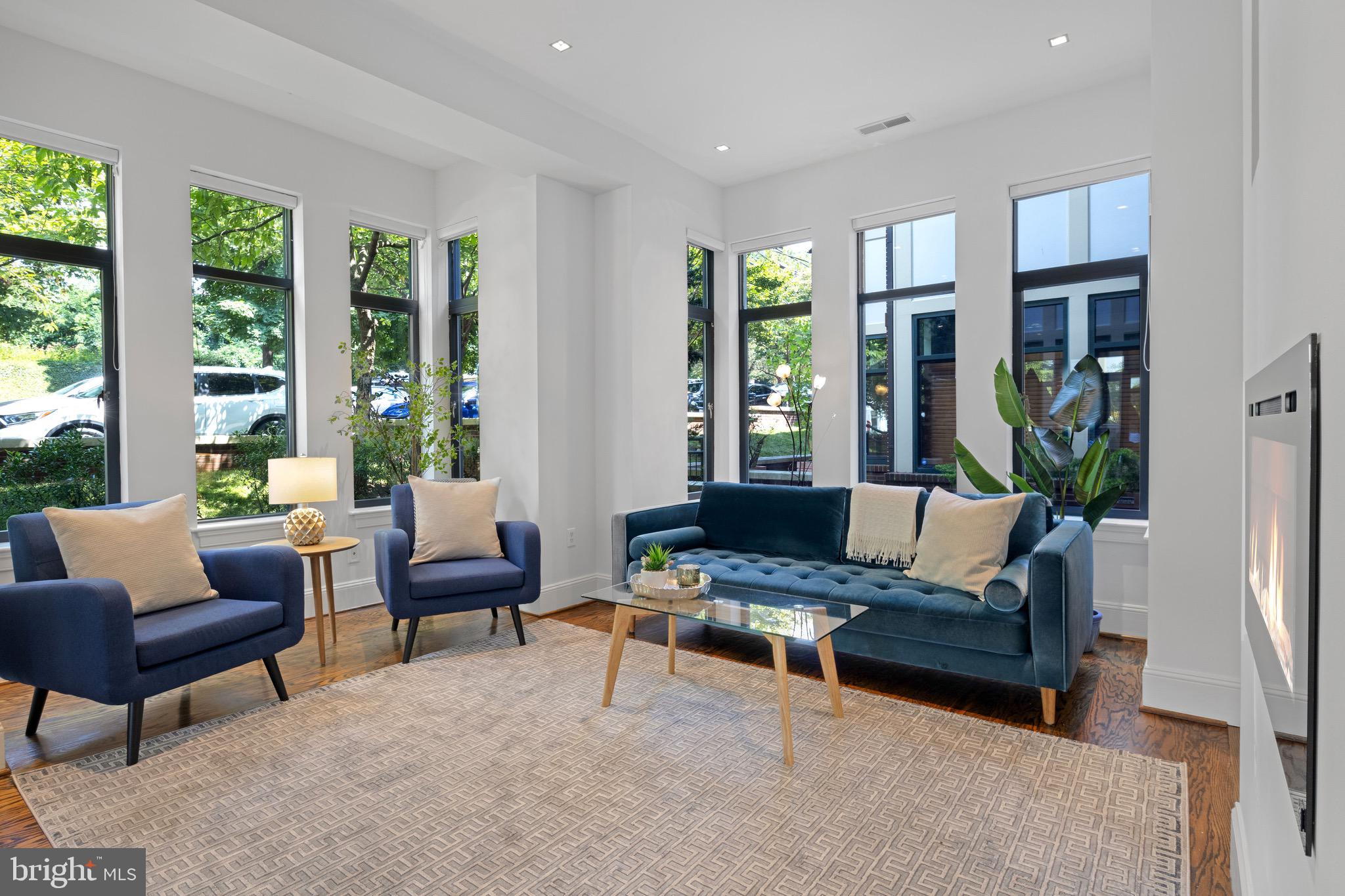 4750 41st Street Northwest Washington, DC 20016 - Photo 6 of 39 Spacious Living Room with Floor To Ceiling Windows