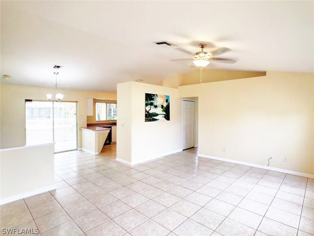 17424 Delaware Road Fort Myers, FL 33967 - Photo 2 of 12 a view of a livingroom with a ceiling fan and window
